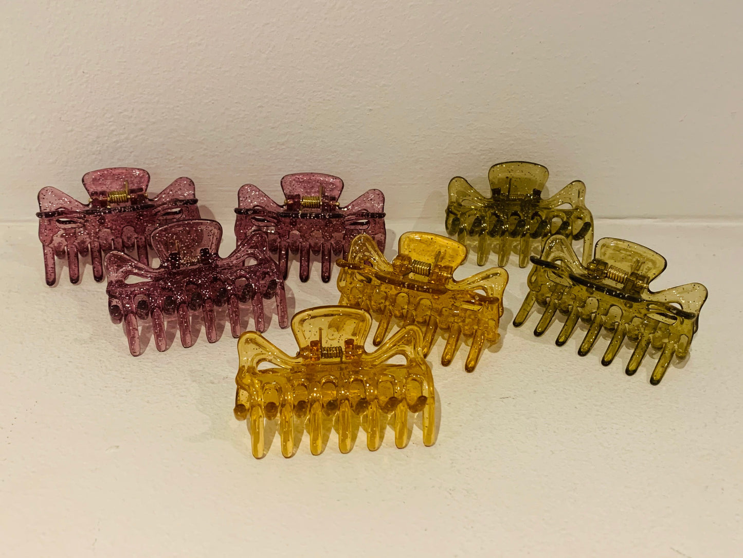 Glittrigt hårspänne, guld