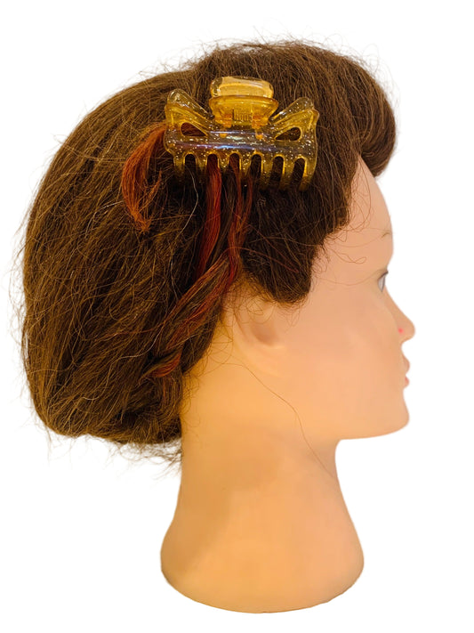 Glittrigt hårspänne, guld