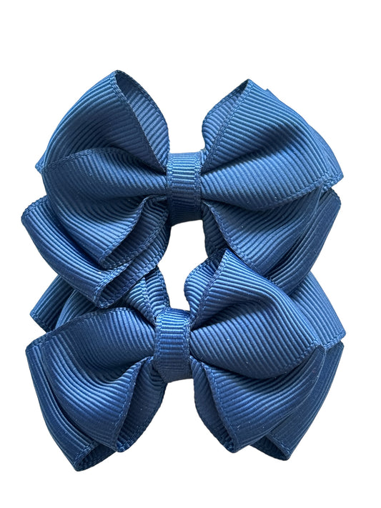 Små marinblåa rosetter, set med 2 st